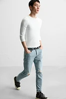 RIPPED SKINNY JEANS