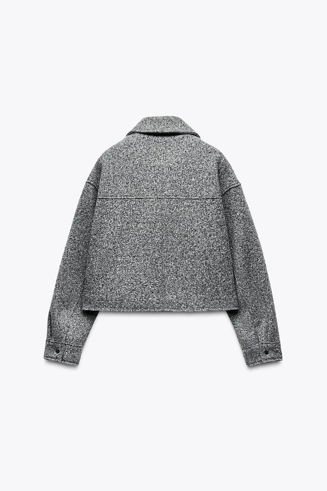 VESTE COURTE BOUCLÉE