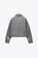 VESTE COURTE BOUCLÉE