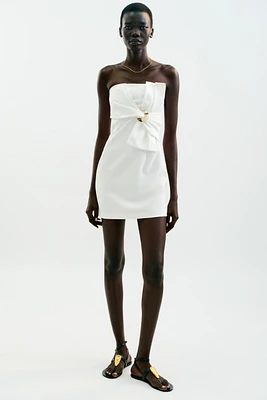 ROBE COURTE NŒUD DÉCOR DORÉ