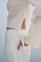HAUT À TEXTURE AVEC NŒUDS