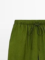 Flowing satin trousers with elastic waistband