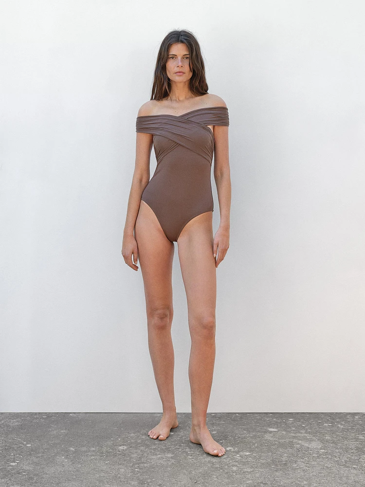 Bandeau swimsuit with criss-cross straps