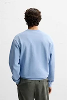 WASHED SNOOPY™ SWEATSHIRT