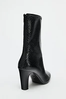 TEXTURED HEELED ANKLE BOOTS