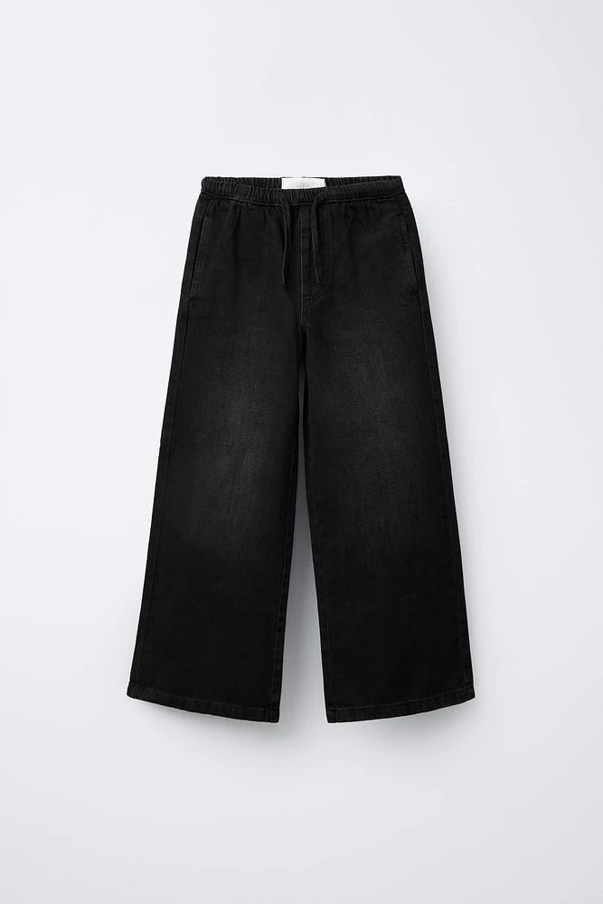 JEAN LARGE À TAILLE FINE