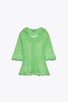 GILET EN MAILLE OUVERT MANCHES COURTES