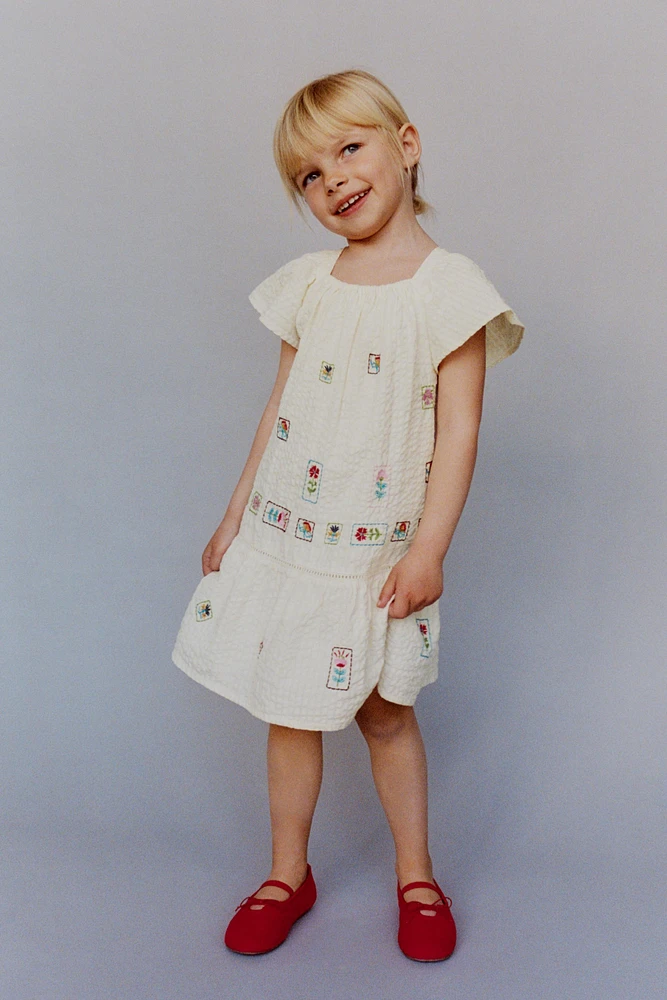 TEXTURED EMBROIDERED DRESS