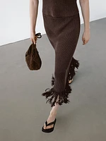 Long knit skirt with fringed hem