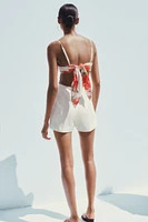CUT OUT HANDKERCHIEF SHORT JUMPSUIT