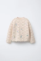 PULL EN MAILLE À FLEURS