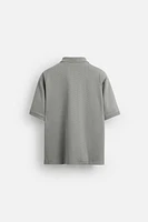 TEXTURED ZIP POLO SHIRT