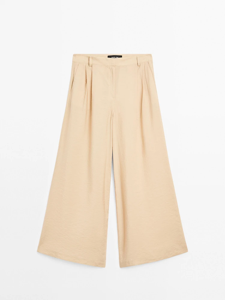Pantalon palazzo à pinces