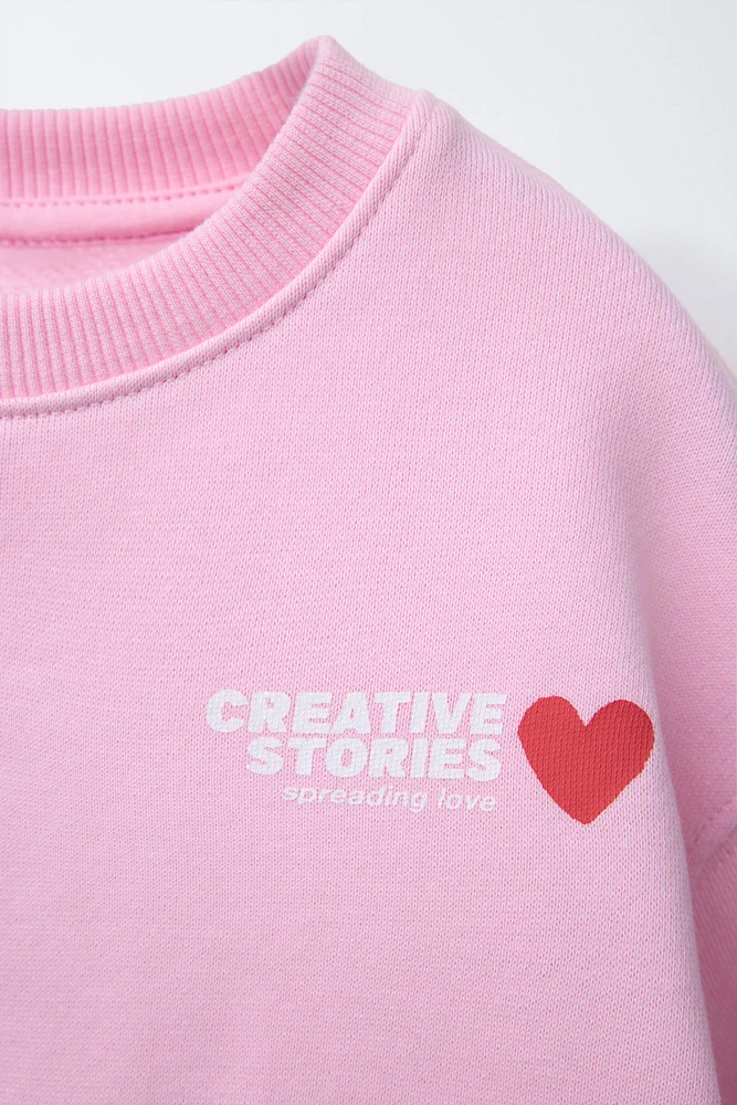 WARM AND COZY PRINT SWEATSHIRT