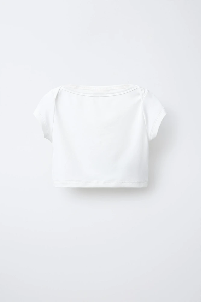TOP CROPPED UNI ÉLASTIQUE