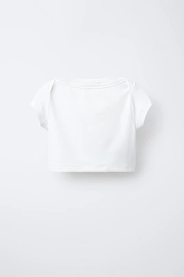 TOP CROPPED UNI ÉLASTIQUE