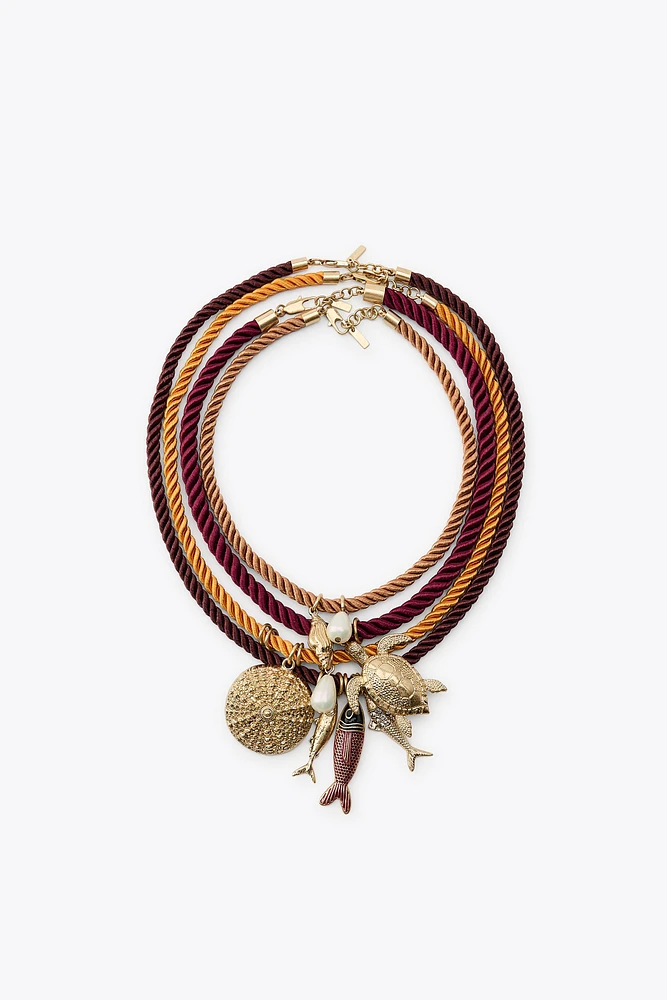PACK OF 4 ROPE NECKLACES WITH MARINE CHARMS