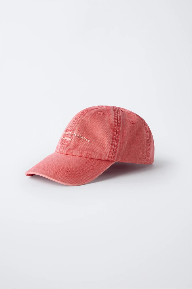 WASHED EFFECT CAP WITH EMBROIDERED TEXT