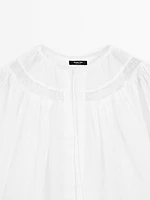 Flowing blouse with lace detail
