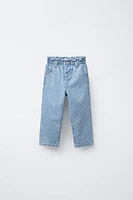 PANTALON EN JEAN PAPERBAG À POIS