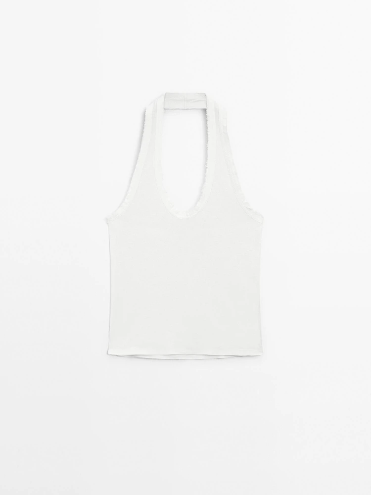 Top slim à encolure américaine effiloché