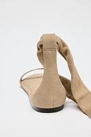 LEATHER STRAPPY FLAT SANDALS