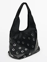 Nappa leather bag with eyelets