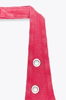 HALTER T-SHIRT WITH RINGS
