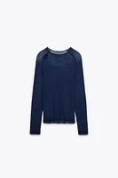 TOP EN MAILLE SEMI-TRANSPARENT
