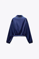 VESTE SATINÉE BANDE LATÉRALE