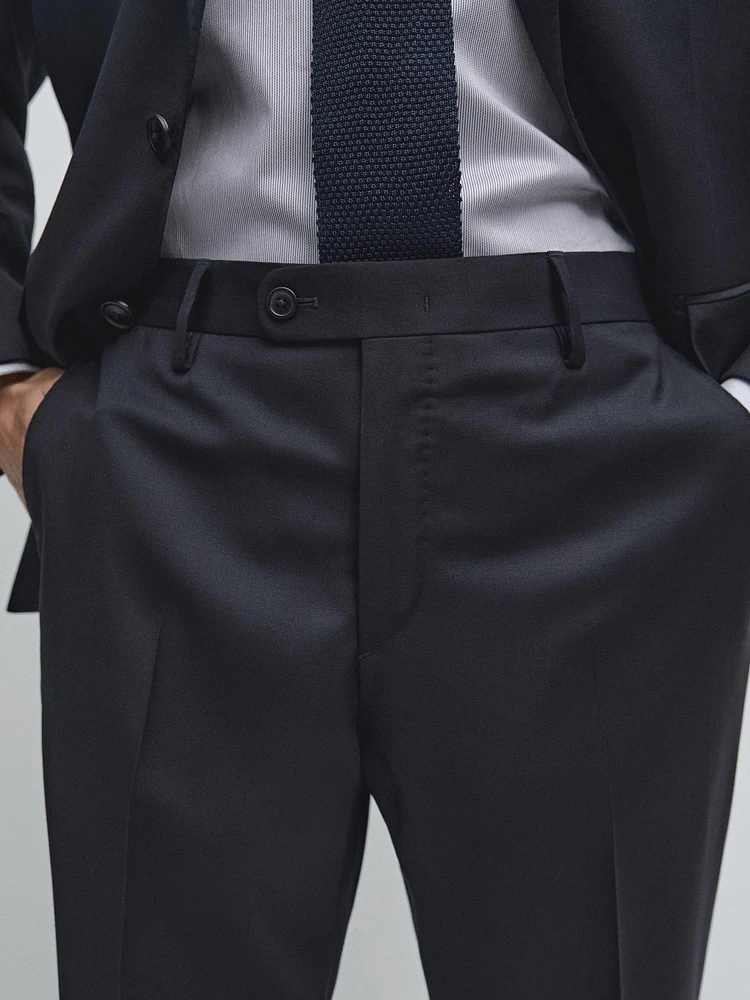 Pantalon de costume uni en laine