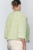 GILET EN MAILLE À FRANGES AVEC LACET ORGANZA