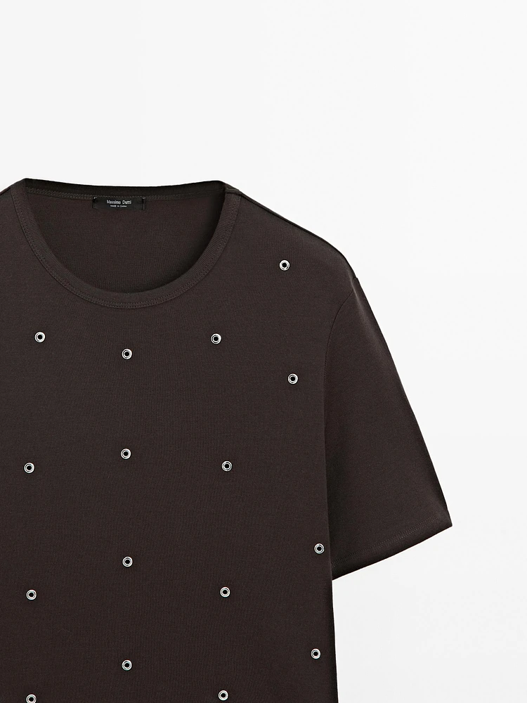 Oversized T-shirt with eyelets