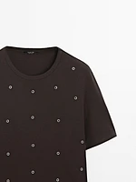 Oversized T-shirt with eyelets