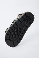 SANDALES EN CUIR ANIMAL PRINT