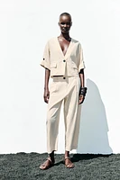 PANTALON À PINCES ET TAILLE ÉLASTIQUE