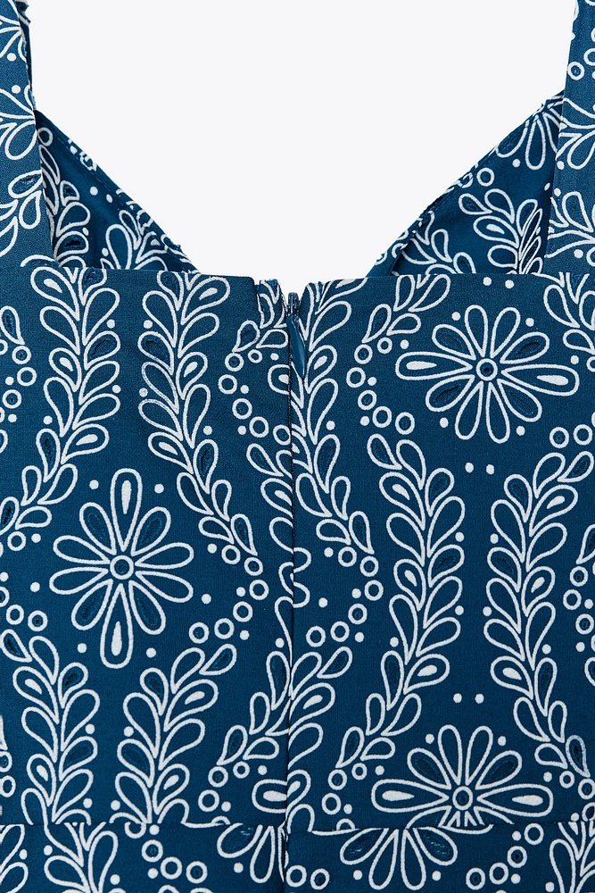 ROBE MIDI BRODERIES AJOURÉES EFFET GOMME