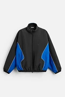 BLOUSON TECHNIQUE AVEC BLOCS DE COULEUR