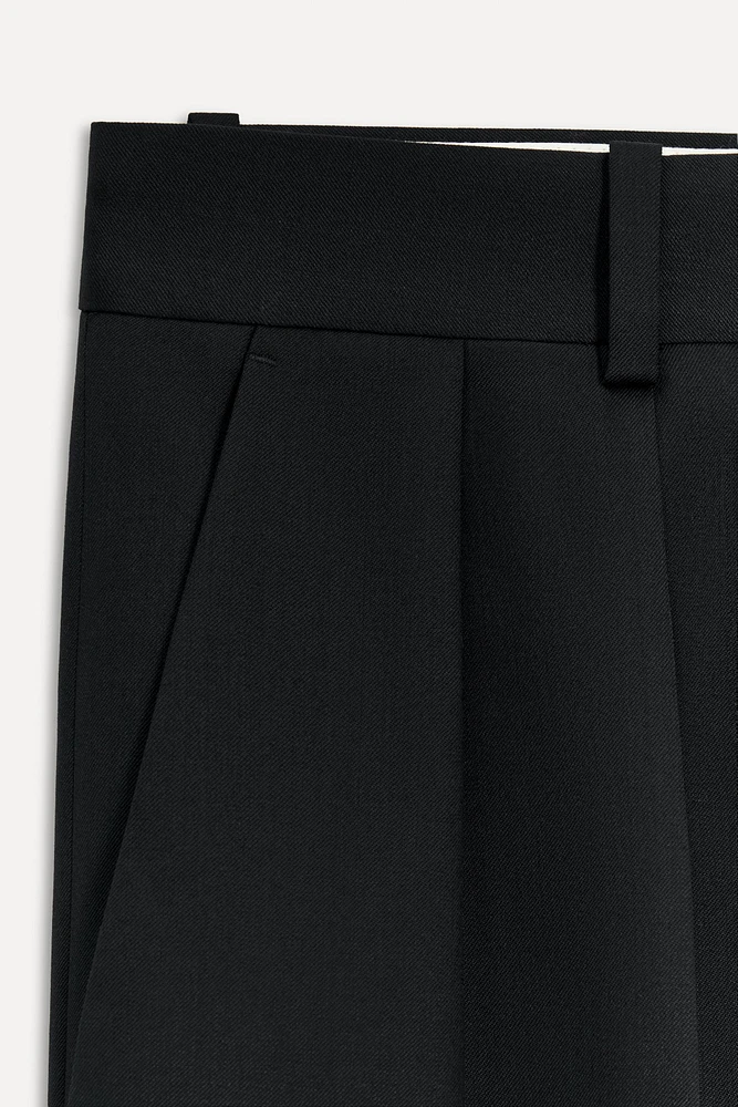 PANTALON À PINCES CONTENANT DE LA LAINE 50E ANNIVERSAIRE