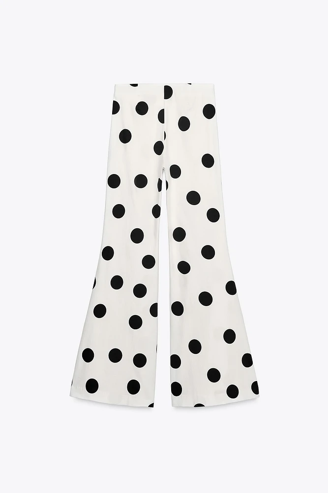 PANTALON FLARE À POIS TAILLE HAUTE