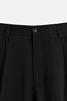FLOWY PLEATED PANTS