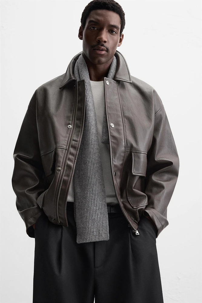 BLOUSON EN MATIÈRE SYNTHÉTIQUE