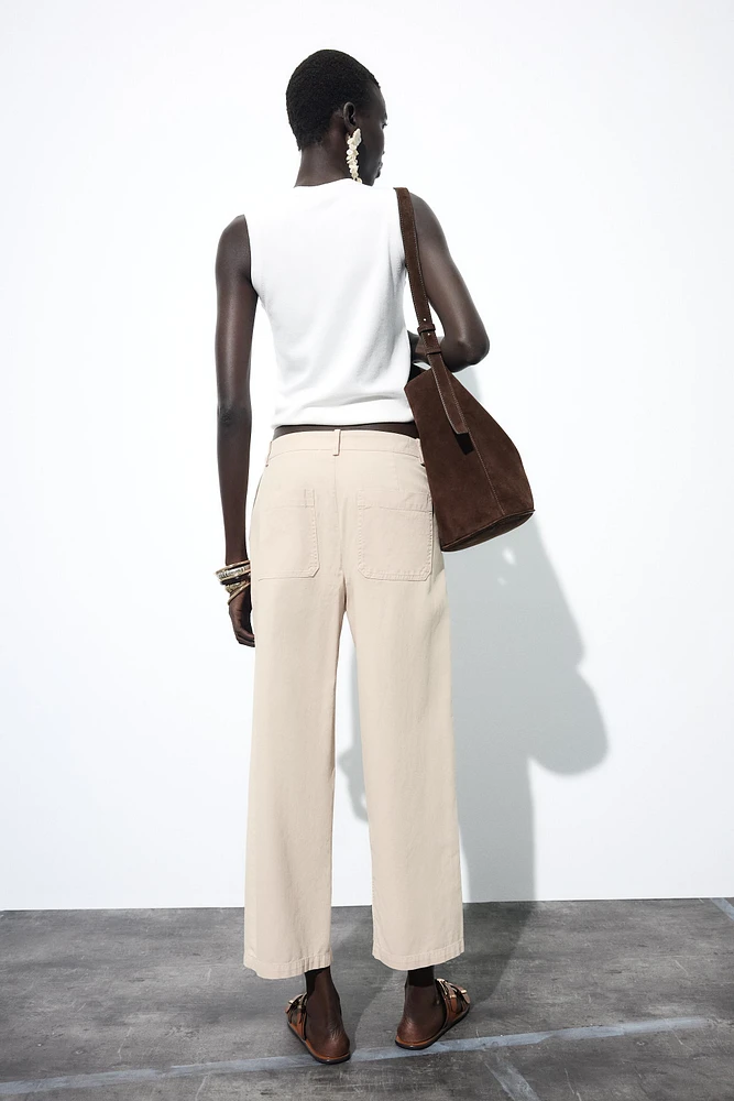 PANTALON CHINO À PINCES