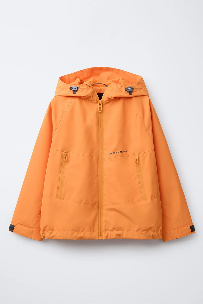 VESTE LÉGÈRE À CAPUCHE DÉPERLANTE