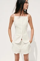 TOP GILET À BOUTONS