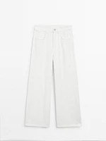 Jean wide leg taille haute avec découpes