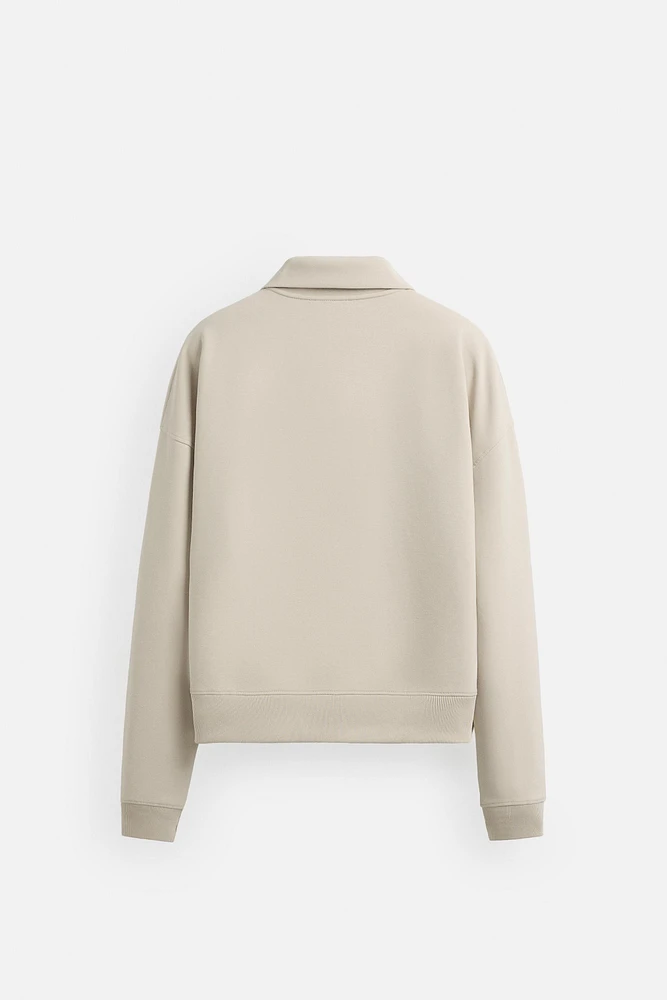QUARTER ZIP TECHNICAL SWEATSHIRT