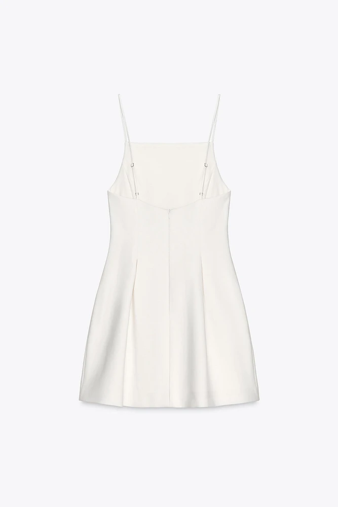 ROBE COURTE À PLIS