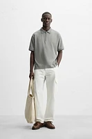 TEXTURED ZIP POLO SHIRT