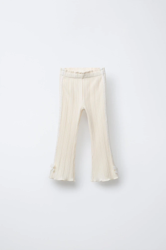 SIDE STRIPE TIE FLARE PANTS